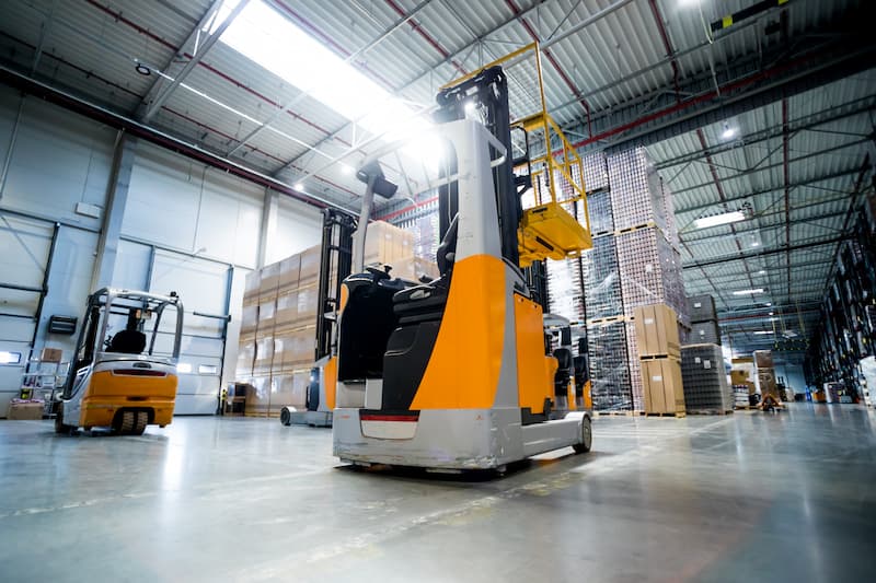 Picture of forklifts in a warehouse