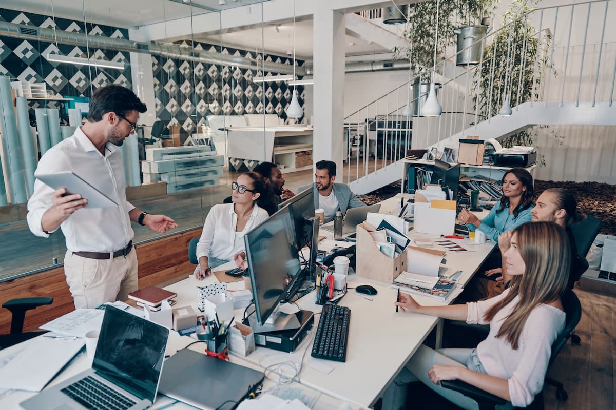 A team of digital workers in a modern office