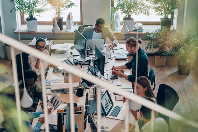 a team of marketing people working in a modern office