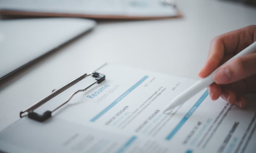 Close up of a person analysing a resume