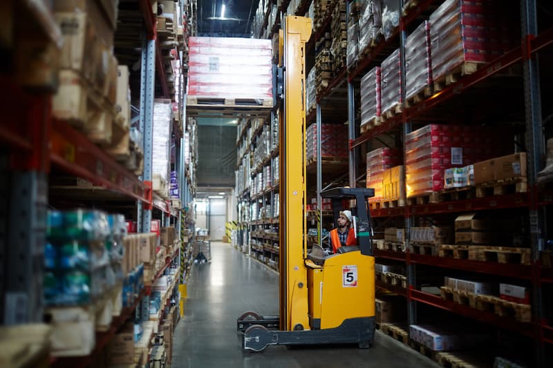 A forklift operator at work