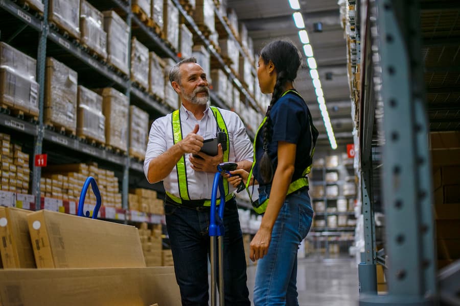 Logistics employees are working warehouse.