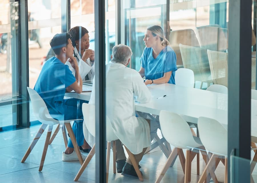 Shot of a group of doctors in a meeting at a hospital.