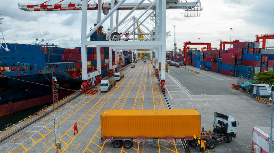 Shipping Containers at a Port Terminal on a Cloudy Day