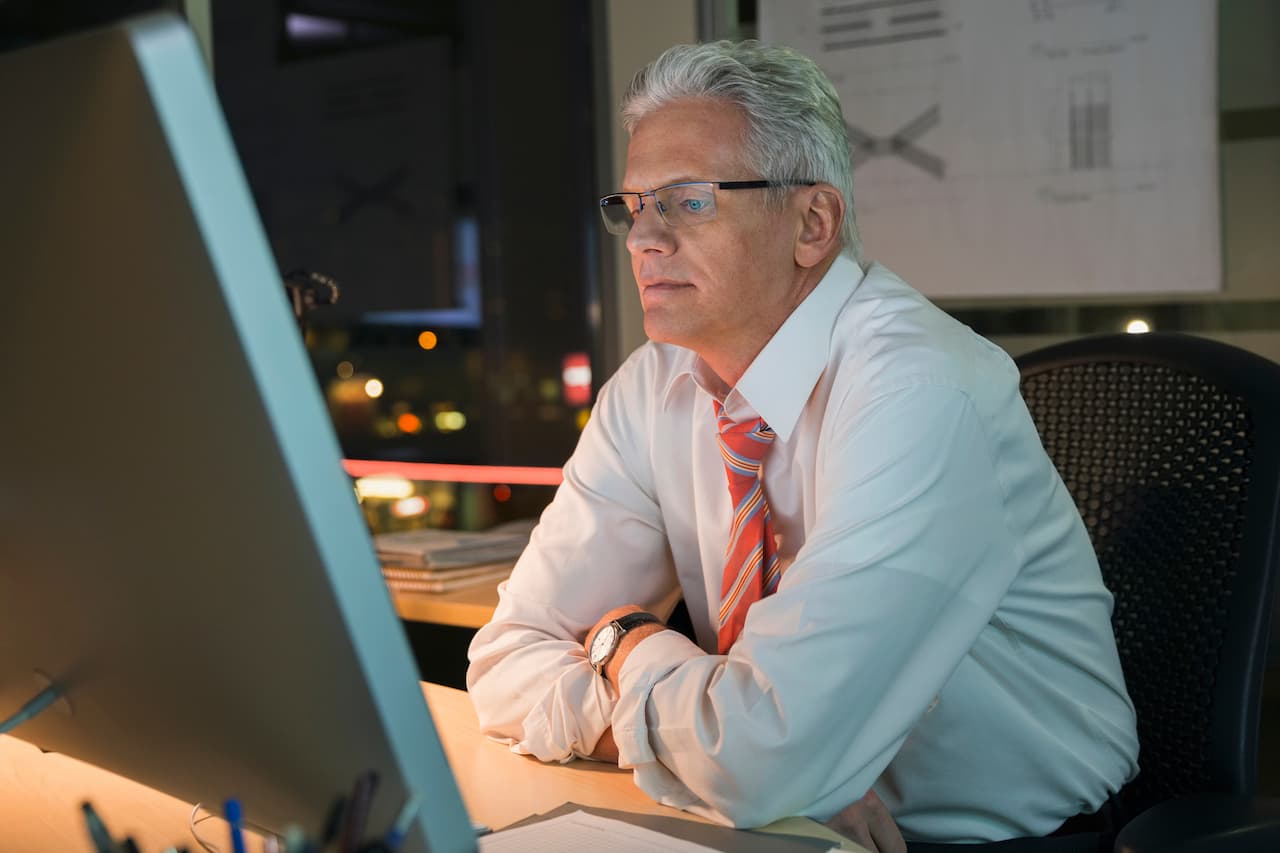 Credit controller working late on the computer