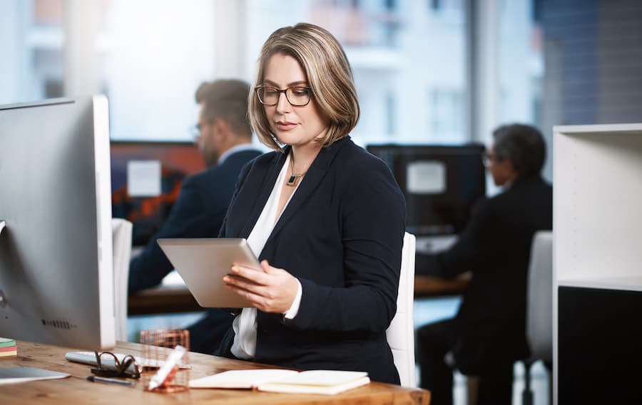 Computer, tablet or business woman in office with CRM platform, monitor client portfolio or email