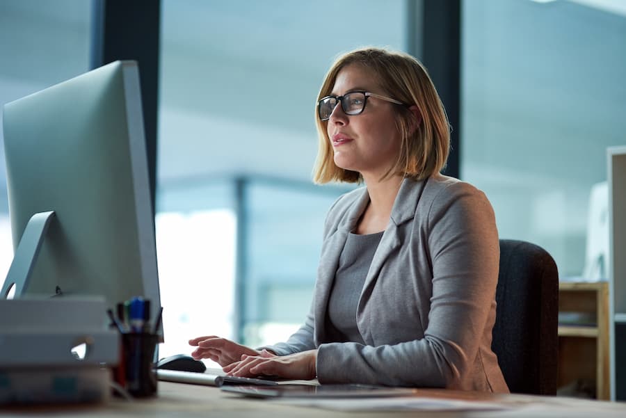 Businesswoman working late at night in her office