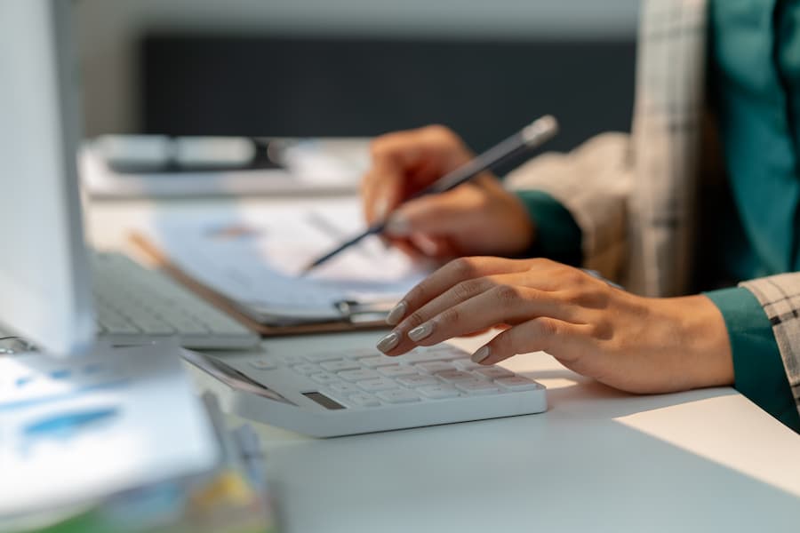 Financial Analysis with Calculator and Spreadsheet Close-Up
