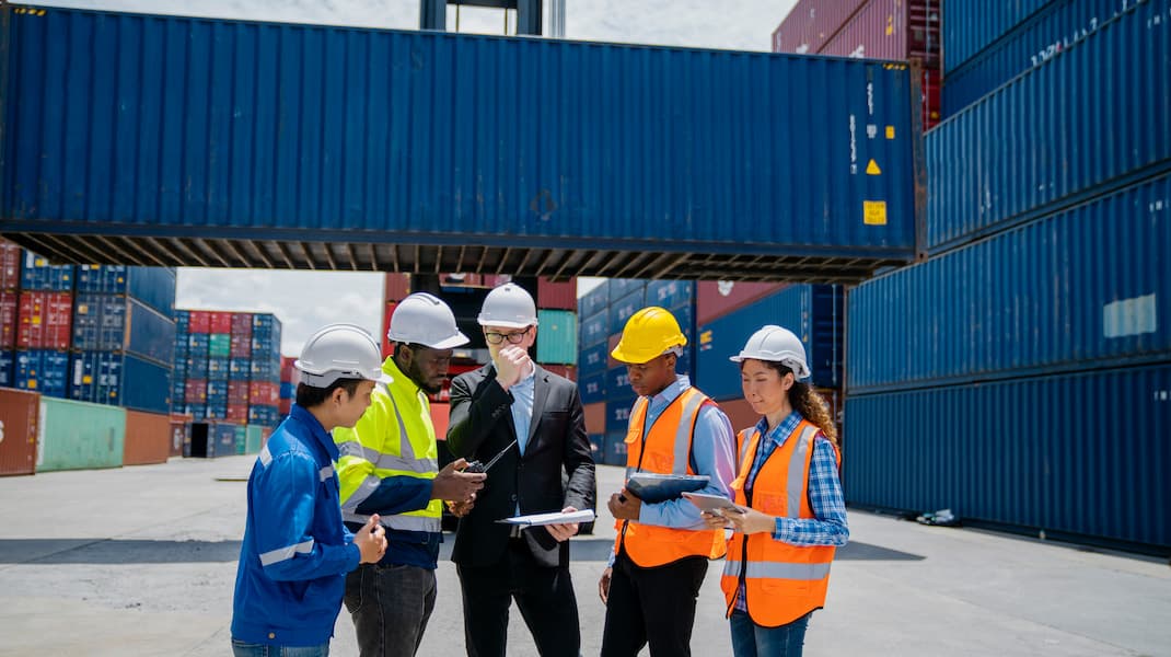 Logistics team outside container dock