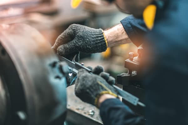 Details of a mechanical fitter at work