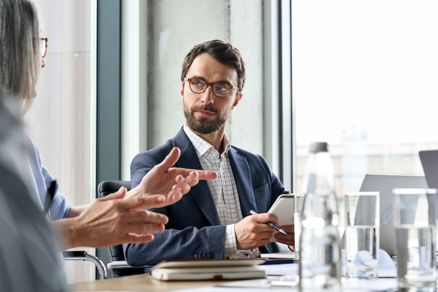 Professional Man in Meeting at Office Conference Table