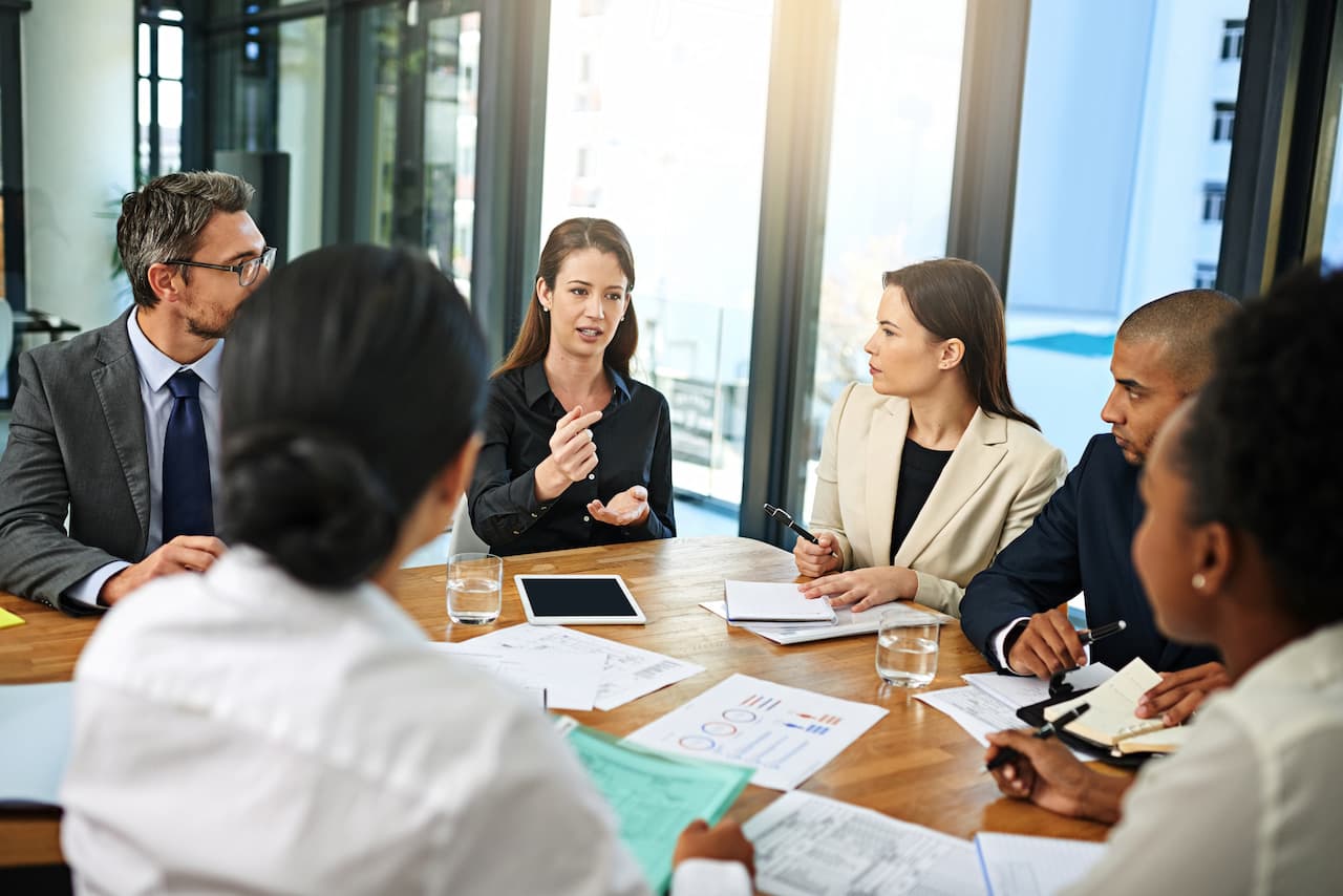 Business Development Manager in team meeting