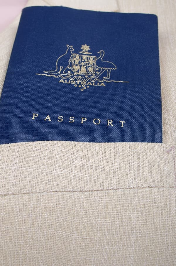 Australian passport resting on a jacket