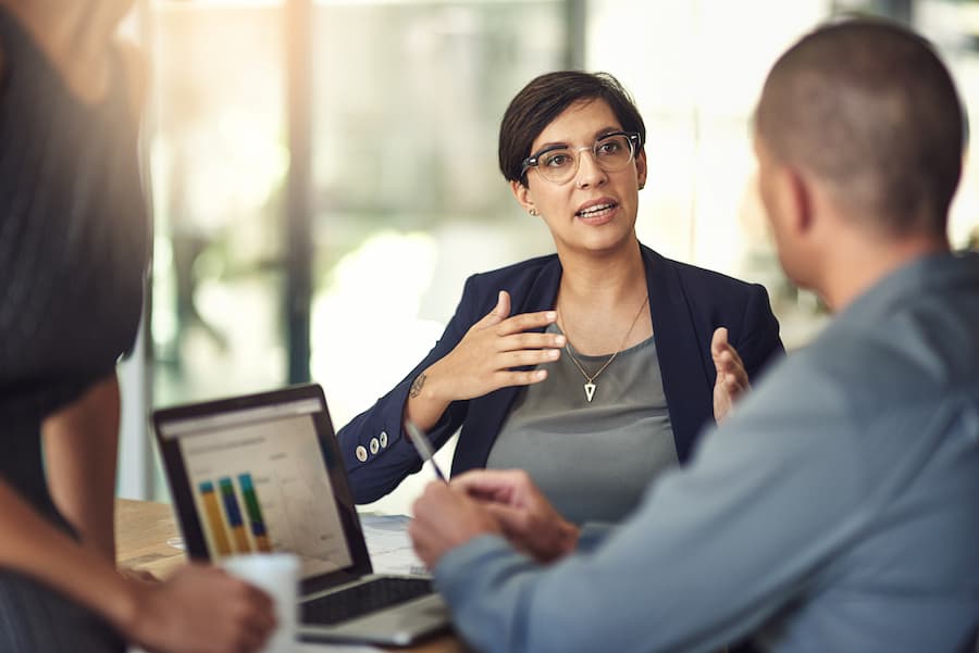 Business Meeting with Data Analysis and Discussion