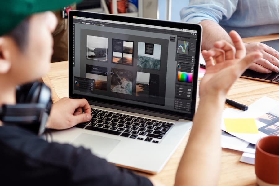 Creative Professional Working on Design Project on Laptop
