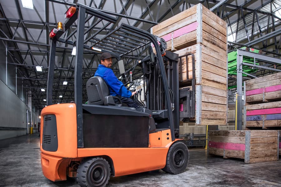 Counterbalance forklift operator on a loading dock