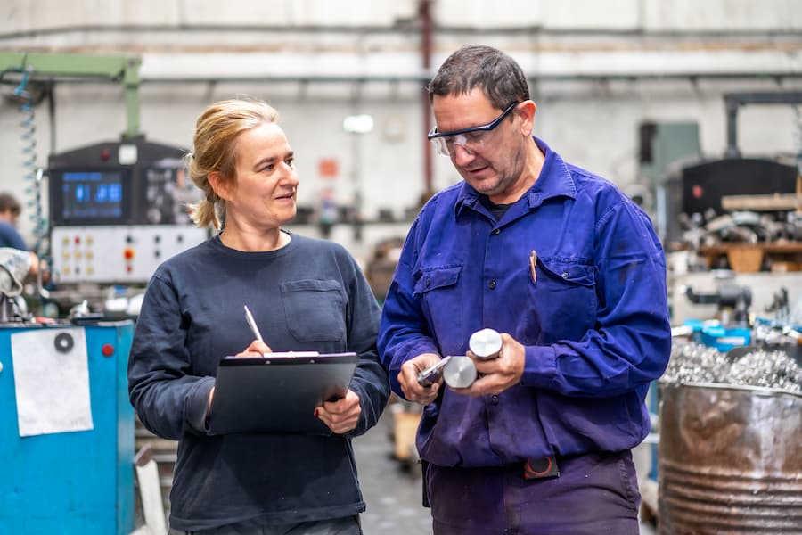 Metal industrial factory workers in discussion