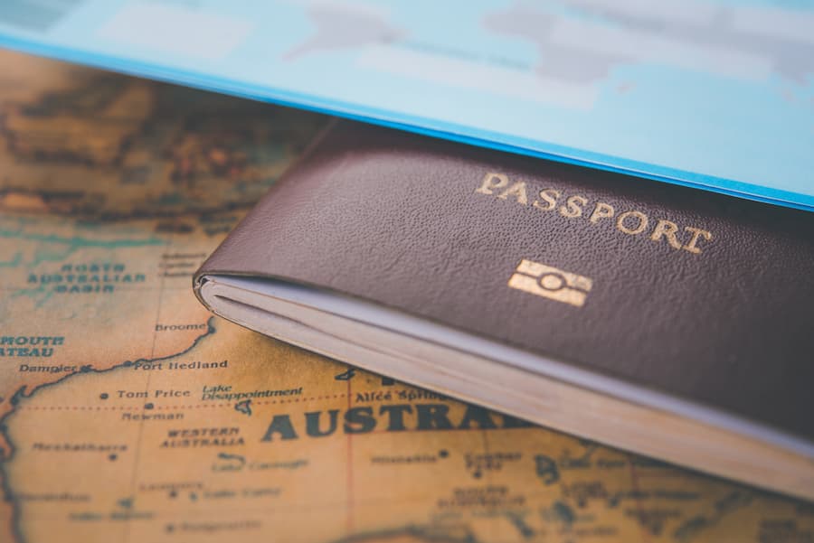 Passport and Vintage Map Illustrating Travel Theme