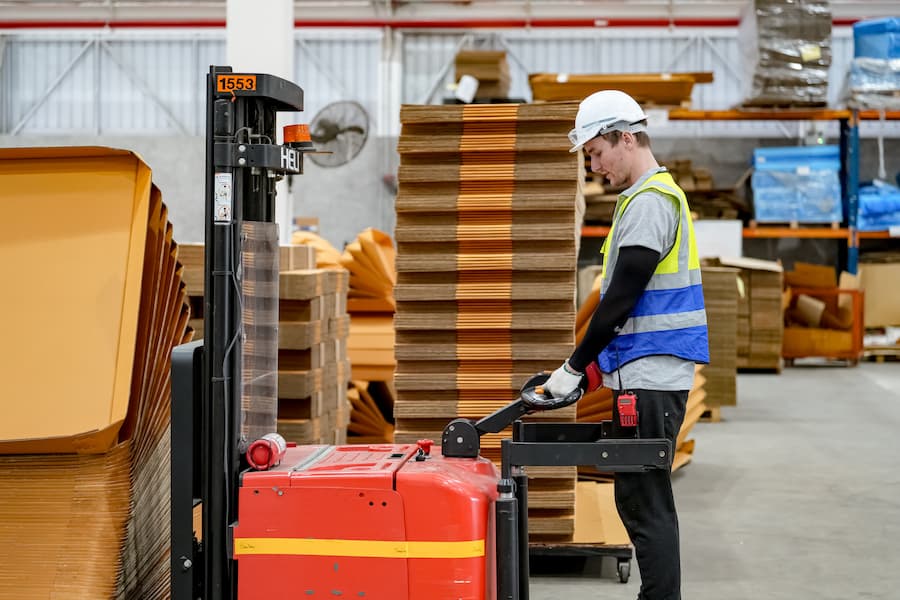 Warehouse Industrial supply chain and Logistics Companies inside. workers on inventory check.