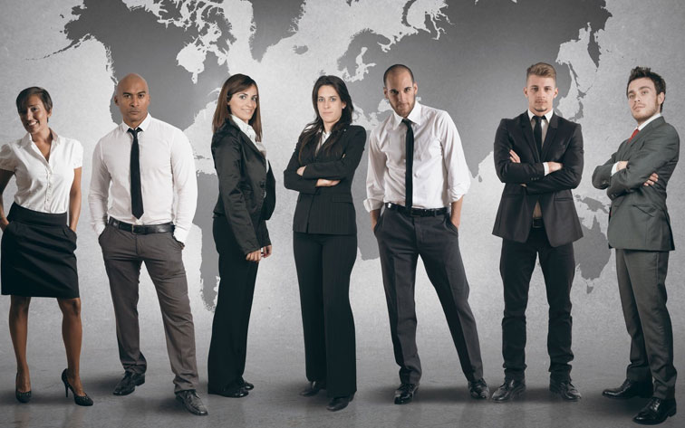 business people standing in front of world map