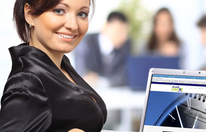 business woman smiling with her laptop computer